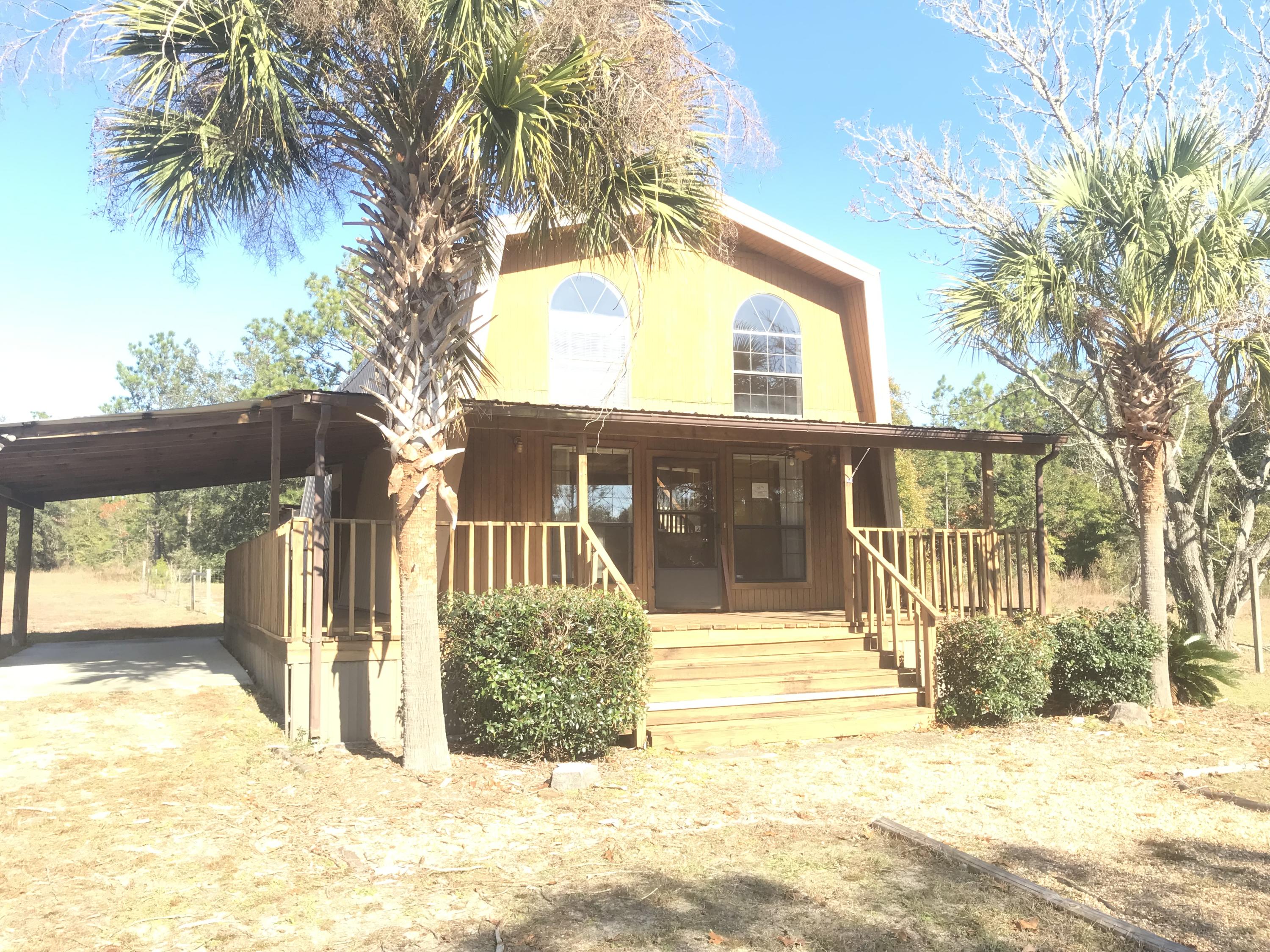 4189 Painter Branch Road Crestview, FL 32539 - Photo 1 of 35 a view of a house with a outdoor space