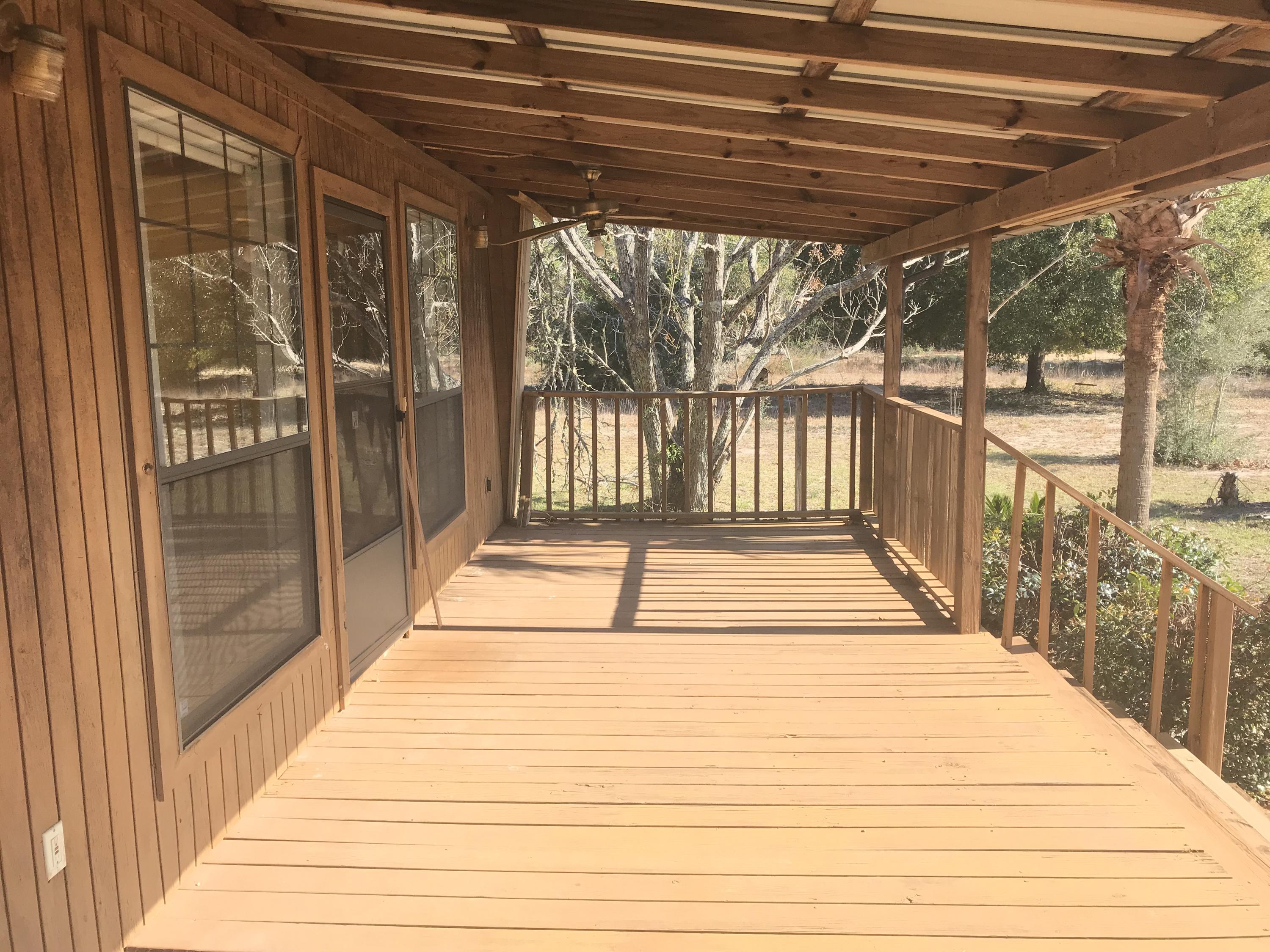 4189 Painter Branch Road Crestview, FL 32539 - Photo 33 of 35 a space with wooden floor