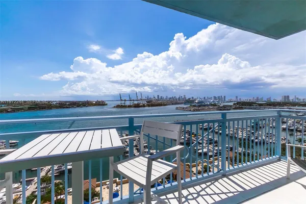 a view of a balcony with wooden floor