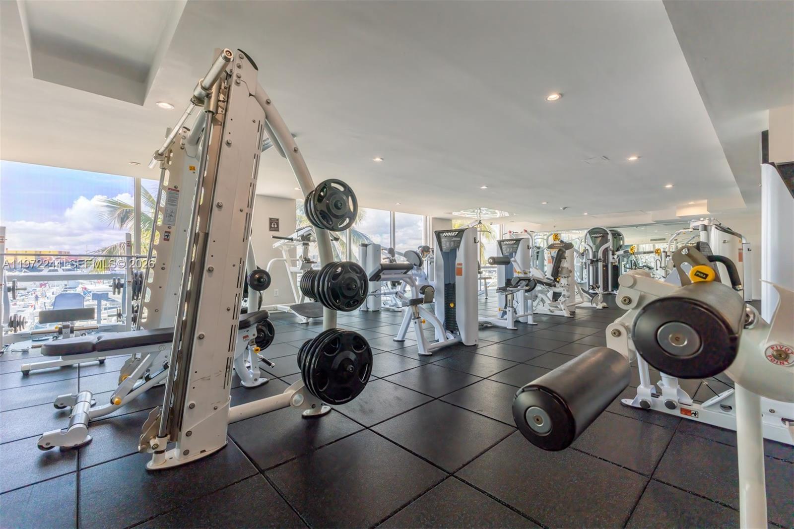 90 Alton Road, Unit 1702 Miami Beach, FL 33139 - Photo 39 of 49 a view of a room with gym equipment