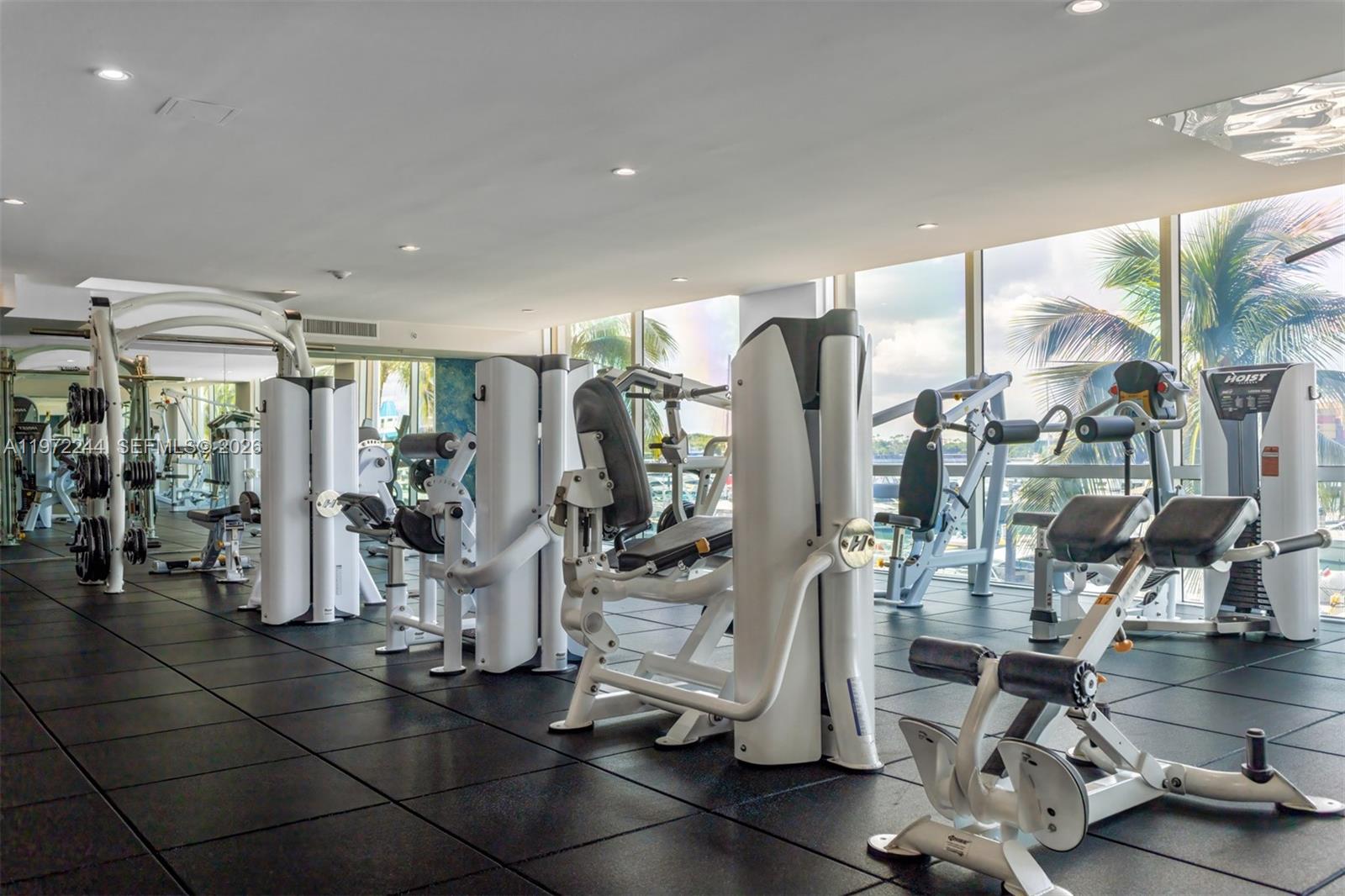 90 Alton Road, Unit 1702 Miami Beach, FL 33139 - Photo 41 of 49 a view of a room with gym equipment