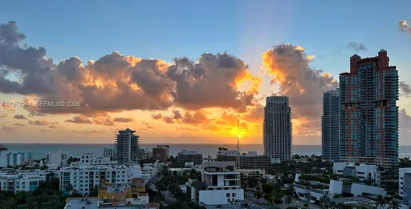 a view of a city with tall buildings
