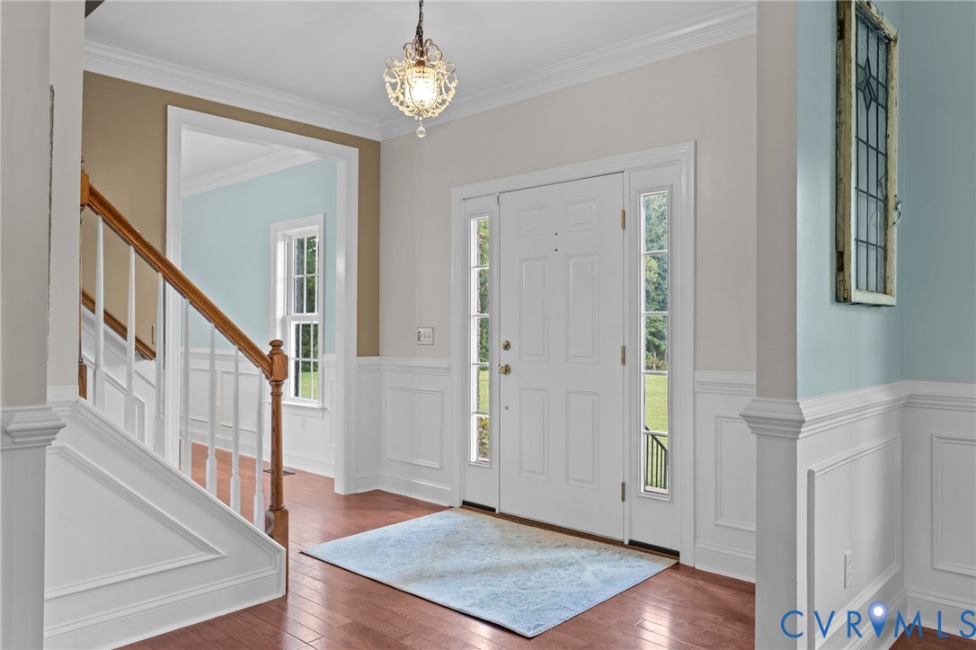 16431 River Road Chesterfield, VA 23838 - Photo 4 of 28 a view of an entryway with wooden floor and stairs