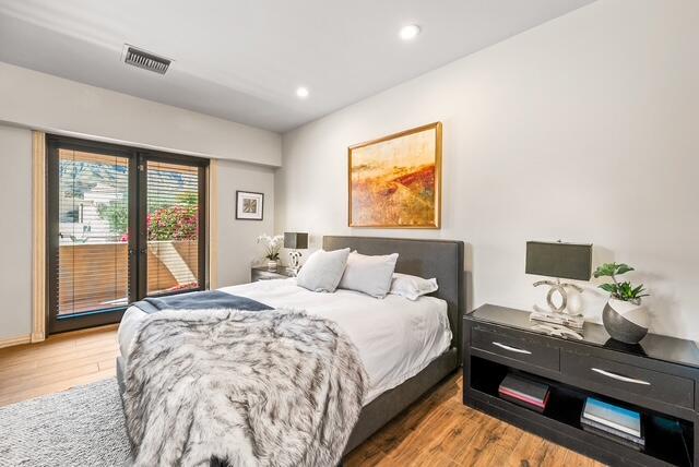 20 Vía Condotti Rancho Mirage, CA 92270 - Photo 24 of 31 a bedroom with a bed window and a flat screen tv