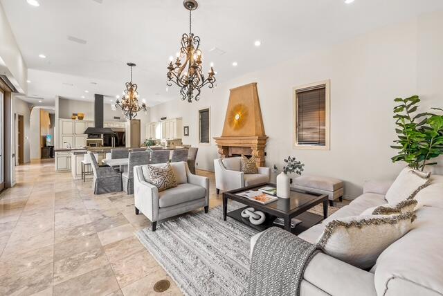 20 Vía Condotti Rancho Mirage, CA 92270 - Photo 9 of 31 a living room with furniture and a chandelier