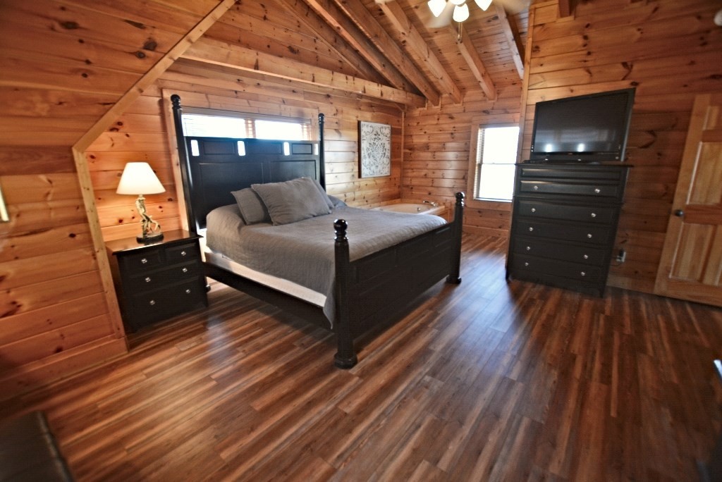 1728 Summit View Way Sevierville, TN 37862 - Photo 20 of 36 a living room with a bed and furniture