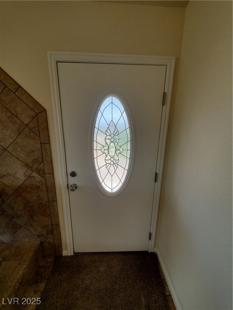 5272 Truman Lane Caliente, NV 89008 - Photo 16 of 39 Doorway to outside with dark carpet
