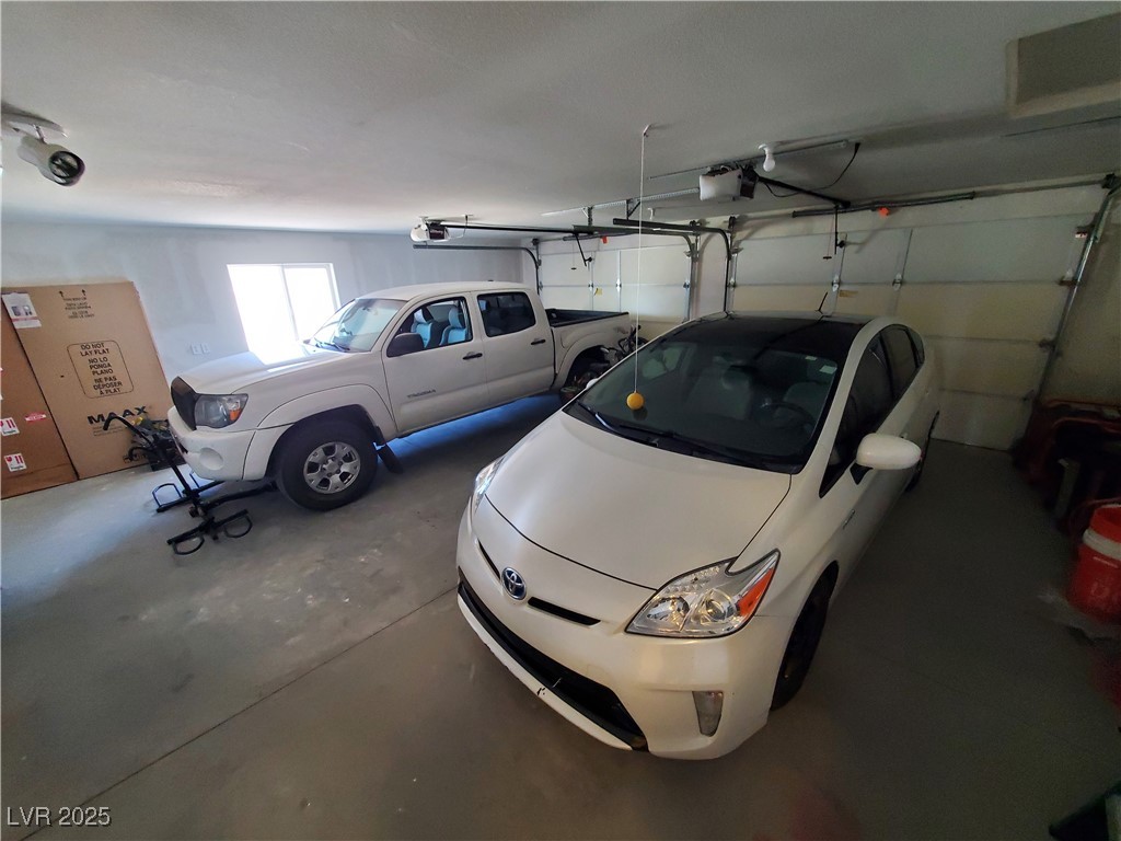 5272 Truman Lane Caliente, NV 89008 - Photo 26 of 39 Garage featuring a garage door opener
