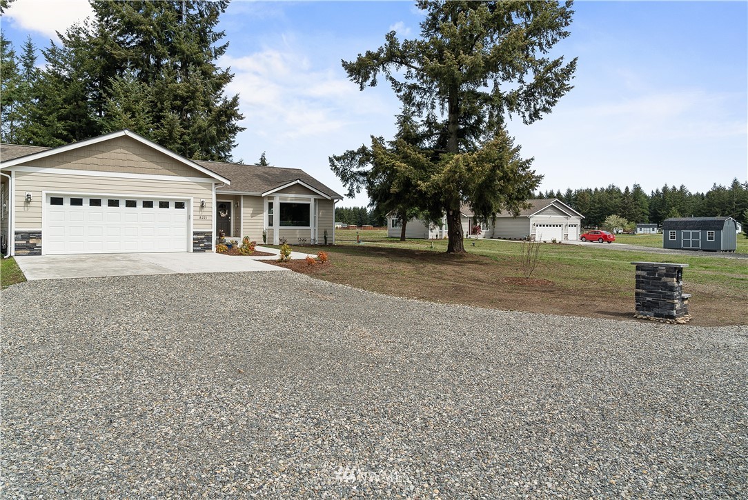 18221 Lawton Lane Southwest Rochester, WA 98579 - Photo 35 of 36 a view of a house with a outdoor space
