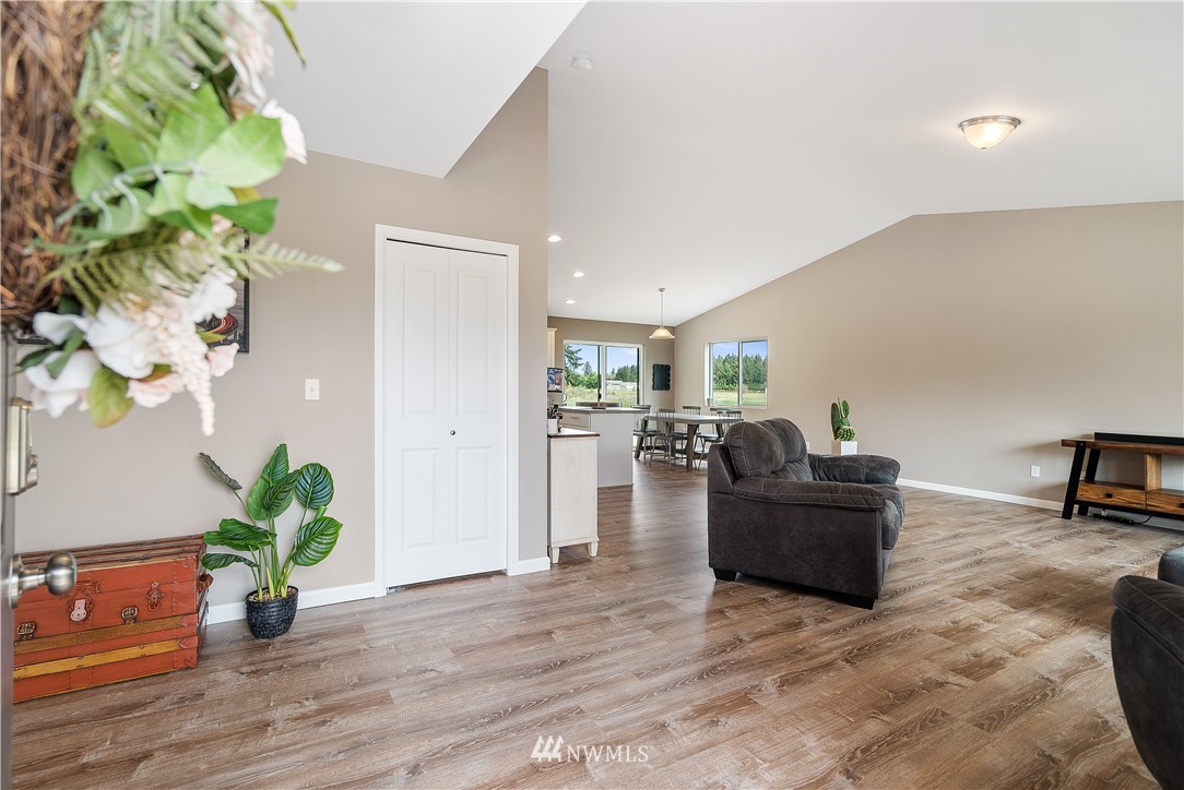 18221 Lawton Lane Southwest Rochester, WA 98579 - Photo 5 of 36 a living room with furniture and a potted plant