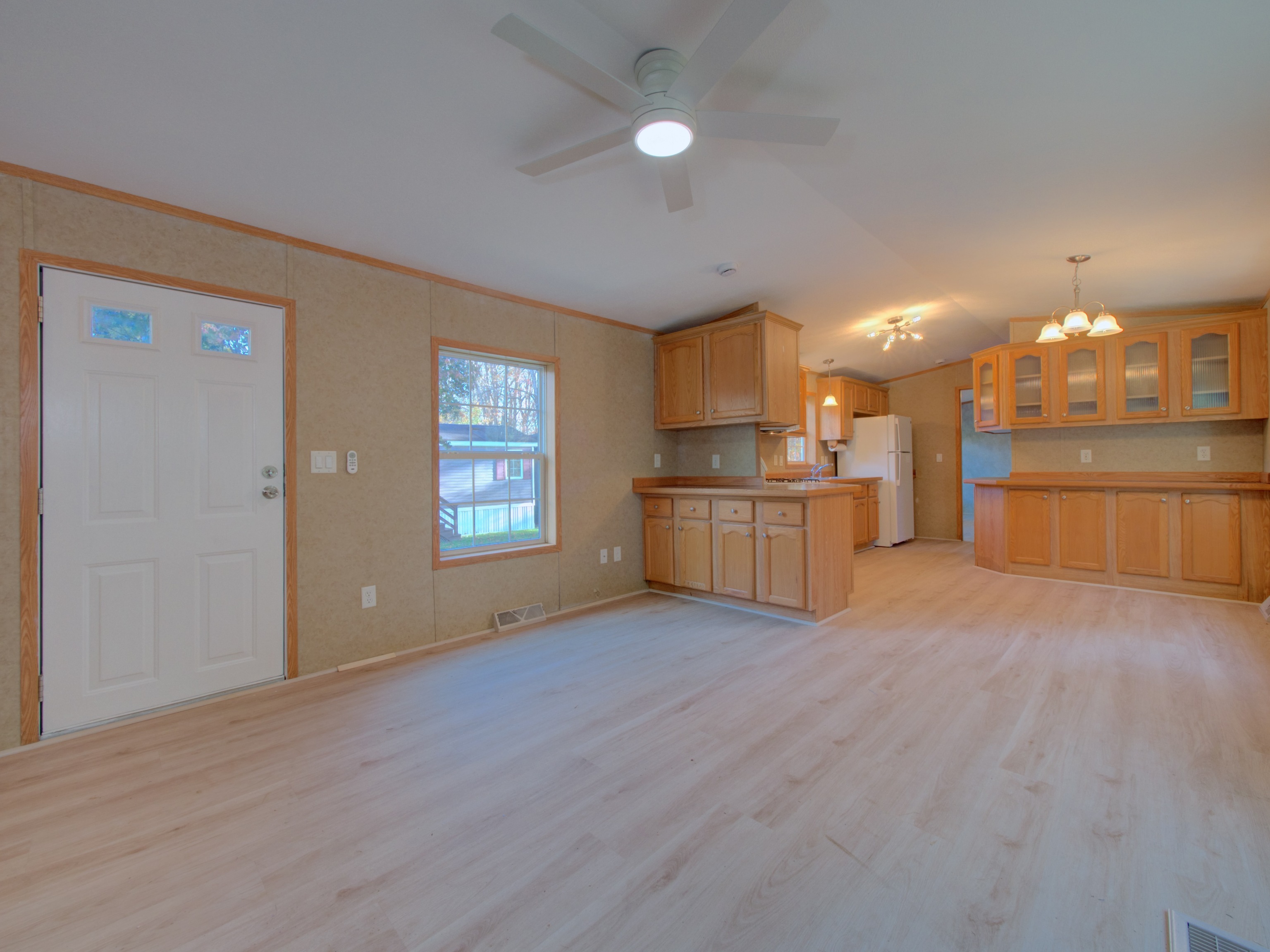 932 Long Cove Road Ledyard, CT 06335 - Photo 3 of 34 a view of a kitchen with a sink and cabinets