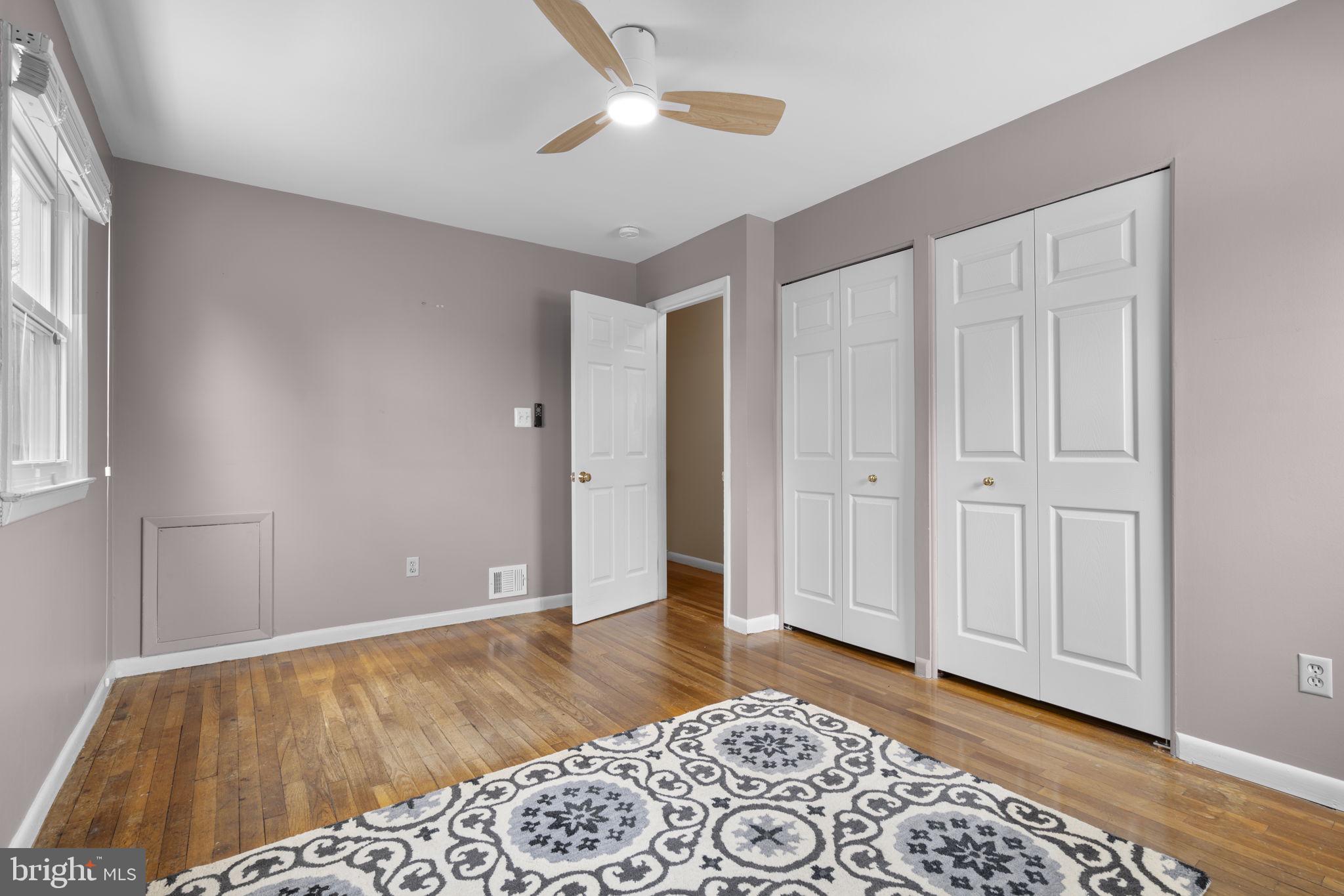 3008 Hardy Avenue Silver Spring, MD 20902 - Photo 15 of 29 a bedroom with a bed and a window