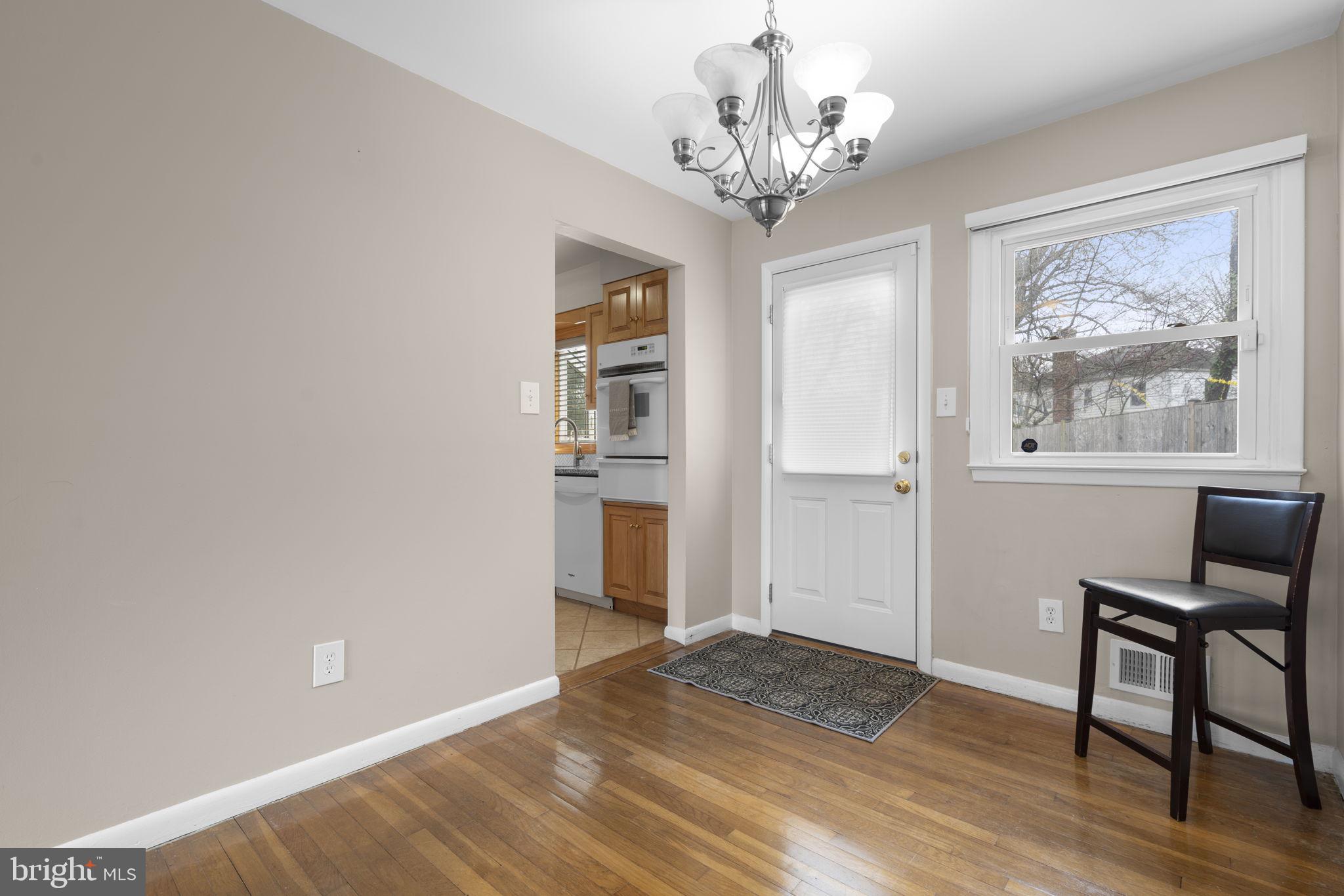3008 Hardy Avenue Silver Spring, MD 20902 - Photo 7 of 29 a view of a livingroom with furniture and wooden floor