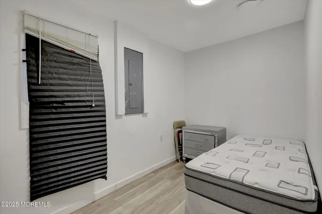 a view of hallway with stairs and closet
