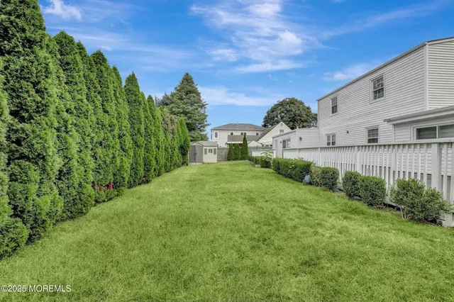 a view of a back yard of the house