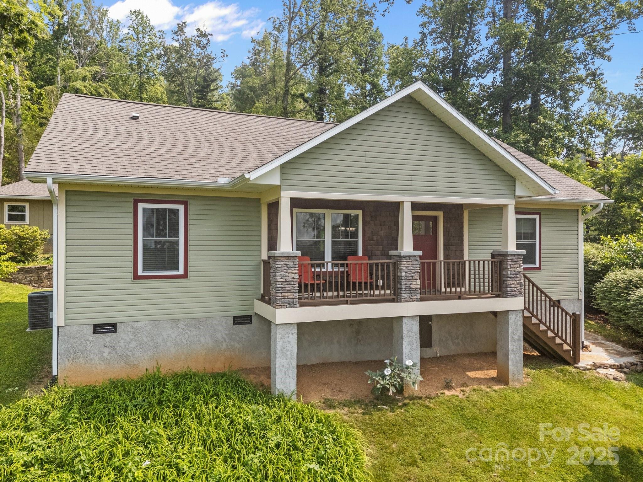 17 Laurel Road Arden, NC 28704 - Photo 1 of 45 a house view with a garden space