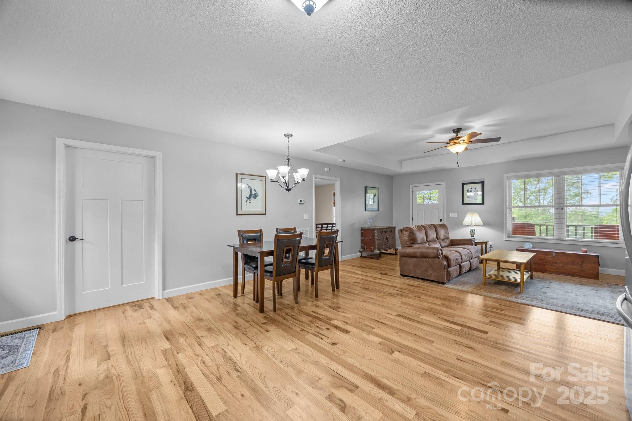 17 Laurel Road Arden, NC 28704 - Photo 14 of 45 a living room with furniture and a wooden floor