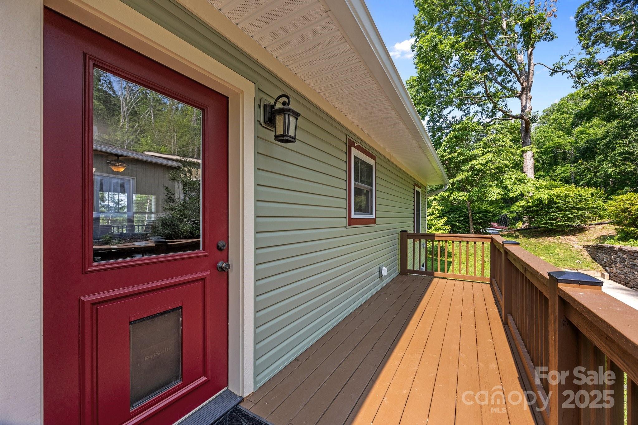 17 Laurel Road Arden, NC 28704 - Photo 23 of 45 a view of a balcony with wooden floor and fence