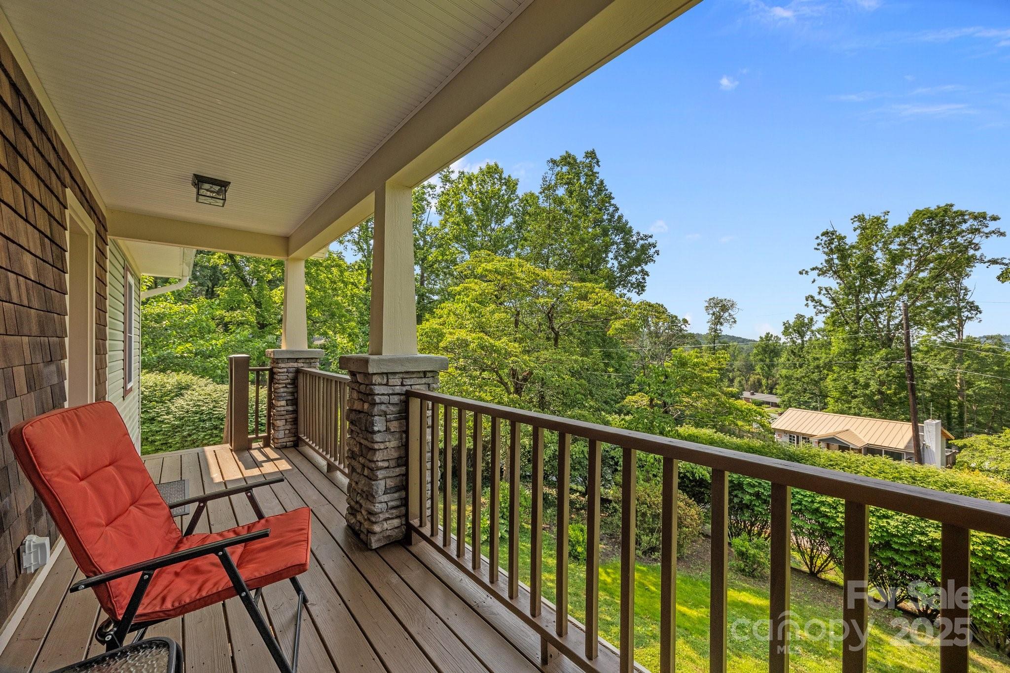 17 Laurel Road Arden, NC 28704 - Photo 3 of 45 a view of a two chair in the balcony