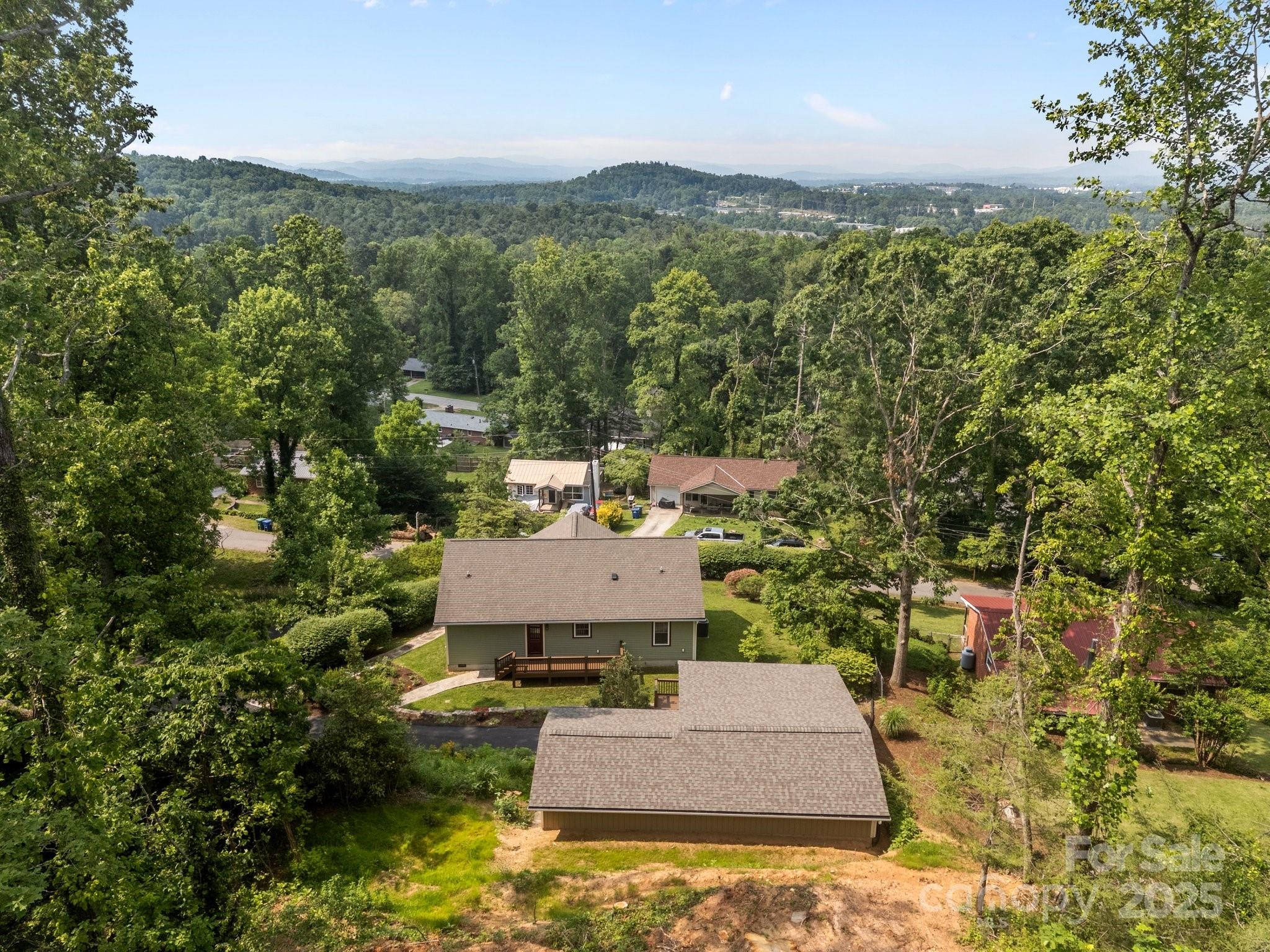 17 Laurel Road Arden, NC 28704 - Photo 39 of 45 an aerial view of a house with a yard