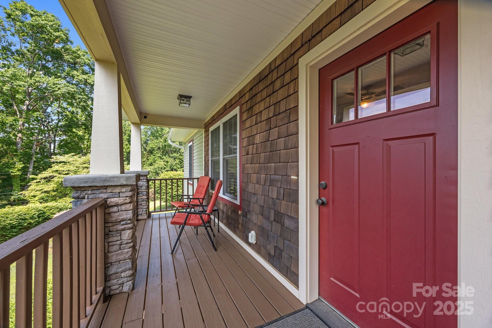 17 Laurel Road Arden, NC 28704 - Photo 4 of 45 a balcony with wooden floor