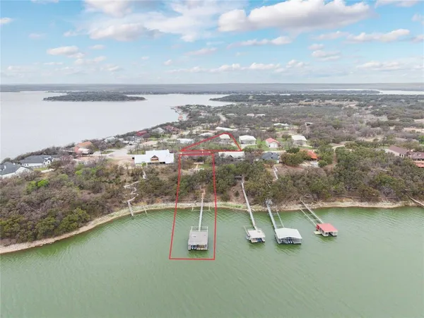 view of a lake with a city