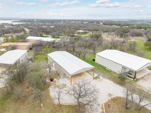 a view of parking garage with cars