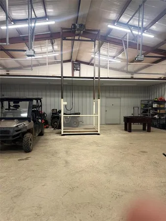 a view of a room with wooden walls