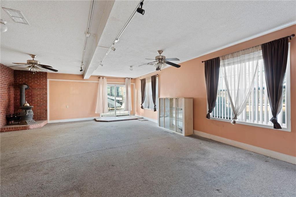 6644 Virlyn B Smith Road Fairburn, GA 30213 - Photo 29 of 43 a view of an empty room with a window