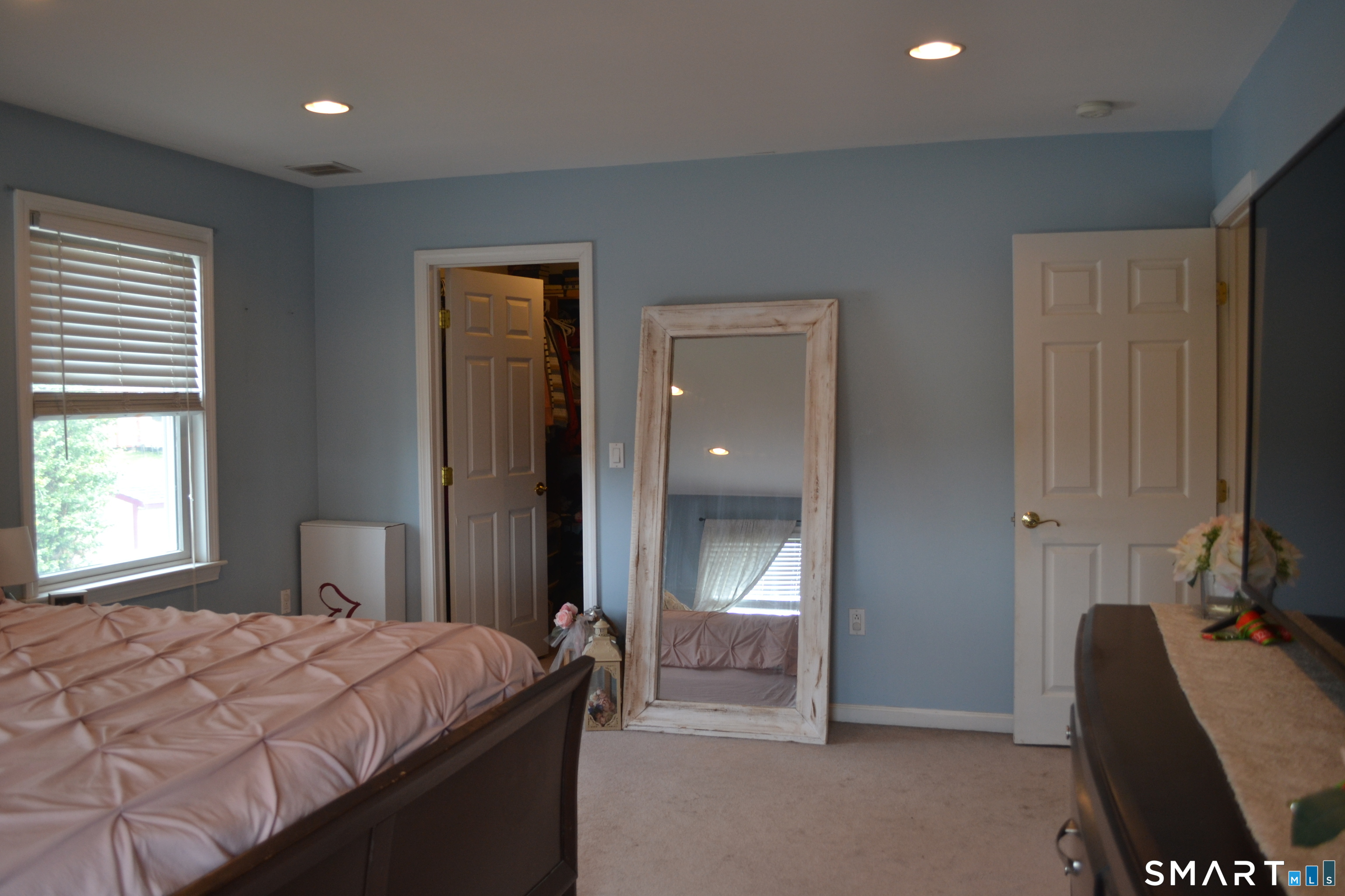 571 Old Colchester Road Montville, CT 06382 - Photo 22 of 25 Primary Bedroom with walk-in closet with closet system installed