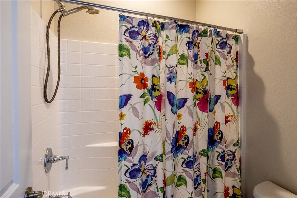 9369 Riberena Circle Atascadero, CA 93422 - Photo 30 of 48 Separate shower and commode make sharing the bathroom easy.
