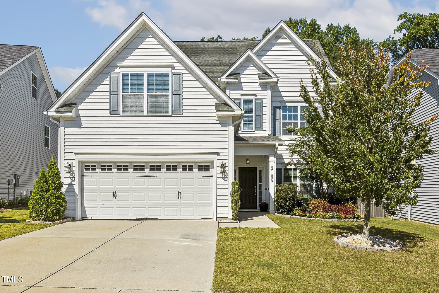 5180 Copain Cove Fuquay-Varina, NC 27526 - Photo 1 of 45 a view of a house with a yard