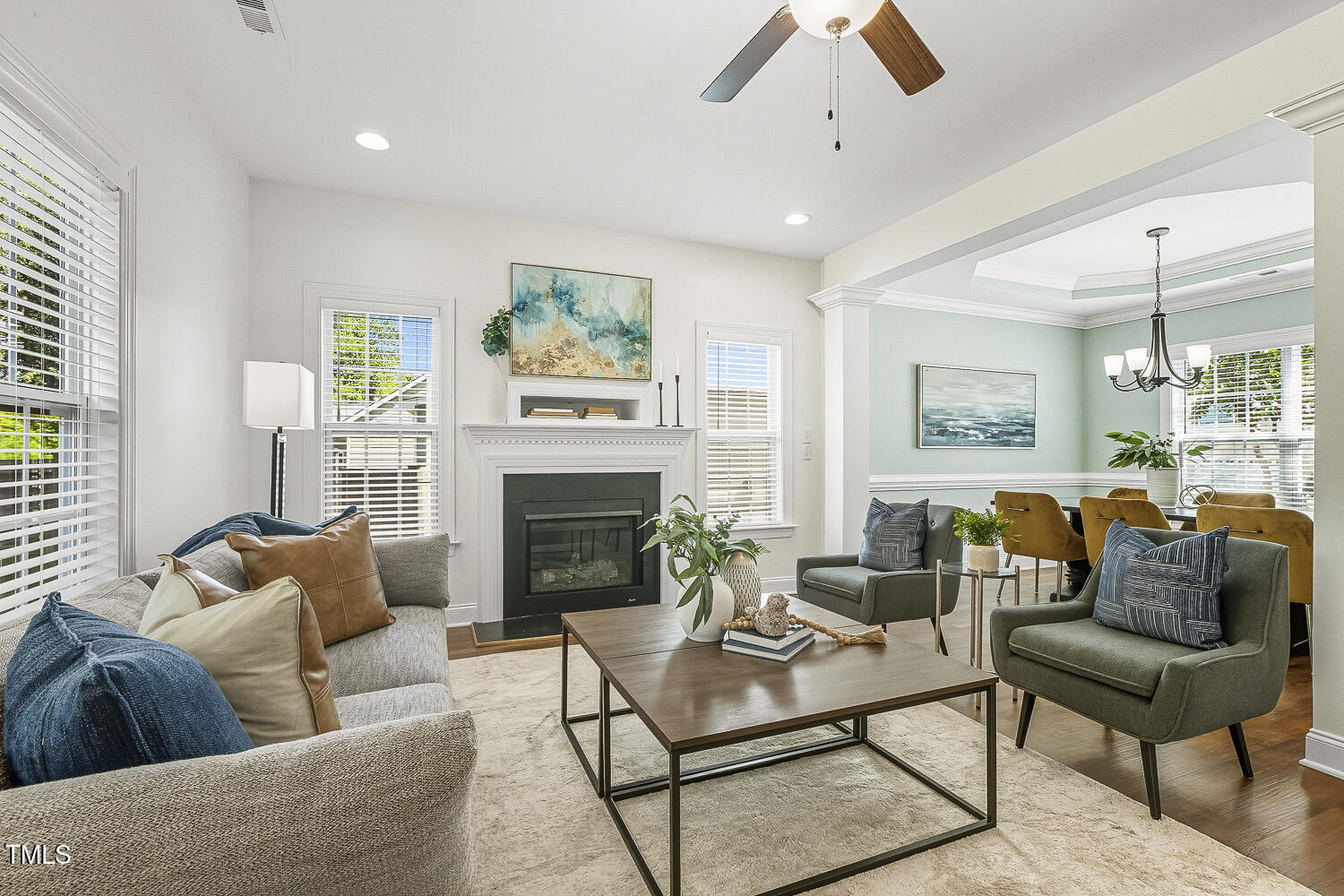 5180 Copain Cove Fuquay-Varina, NC 27526 - Photo 6 of 45 a living room with furniture and a fireplace