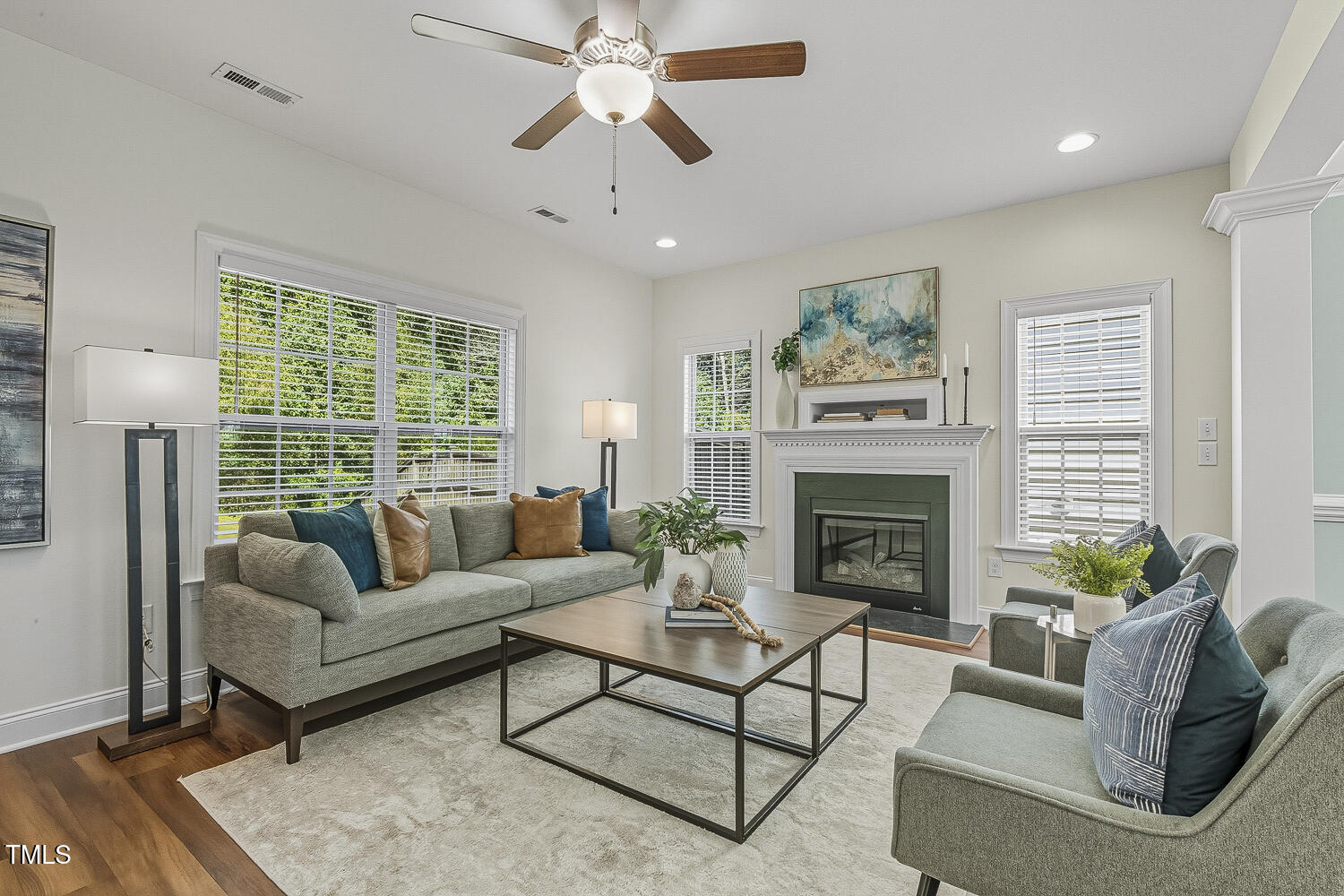5180 Copain Cove Fuquay-Varina, NC 27526 - Photo 9 of 45 a living room with furniture fireplace and a large window