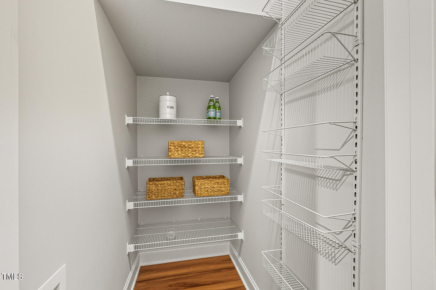 5180 Copain Cove Fuquay-Varina, NC 27526 - Photo 17 of 45 a view of walk in closet with clothes and shoes
