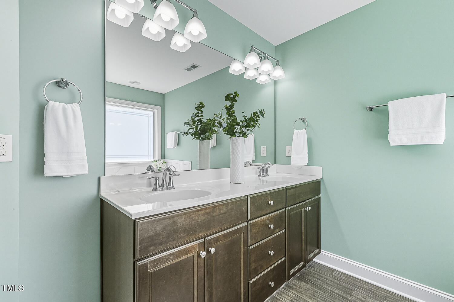 5180 Copain Cove Fuquay-Varina, NC 27526 - Photo 25 of 45 a bathroom with a sink vanity and a mirror