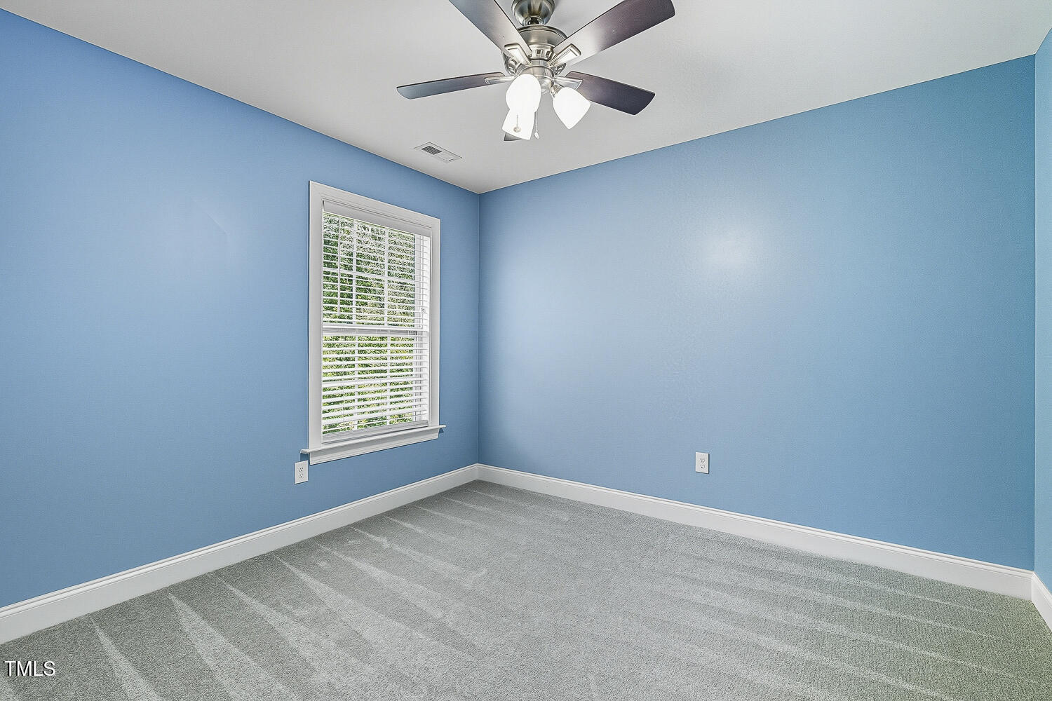 5180 Copain Cove Fuquay-Varina, NC 27526 - Photo 26 of 45 a view of an empty room with a window