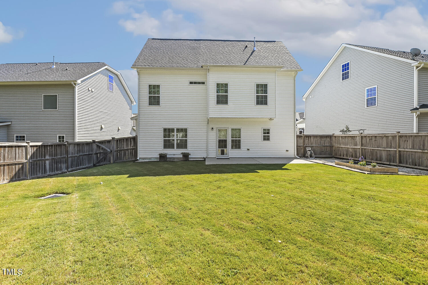 5180 Copain Cove Fuquay-Varina, NC 27526 - Photo 36 of 45 a swimming pool with outdoor seating and yard