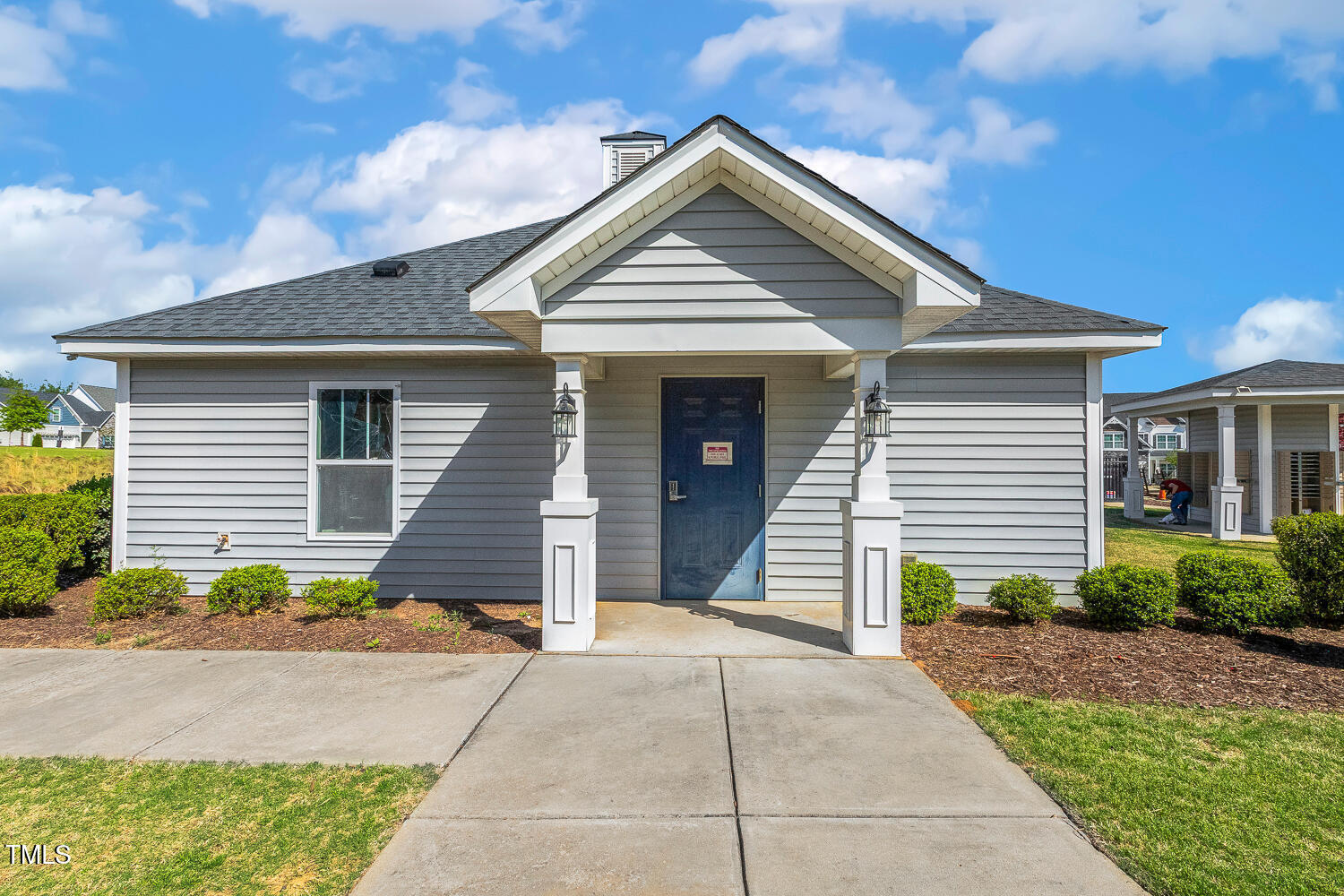 5180 Copain Cove Fuquay-Varina, NC 27526 - Photo 37 of 45 a front view of a house with a yard and garage