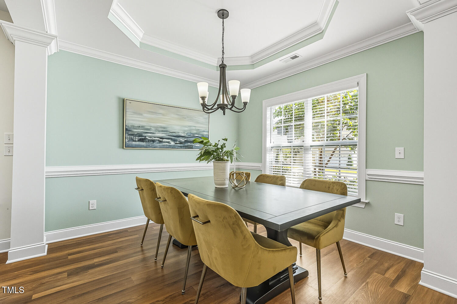 5180 Copain Cove Fuquay-Varina, NC 27526 - Photo 4 of 45 a view of a dining room with furniture window and wooden floor