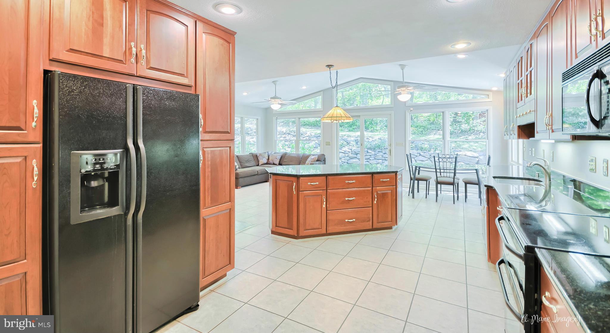8031 Gambrill Park Road Frederick, MD 21702 - Photo 2 of 30 Custom addition creates open, entertaining space