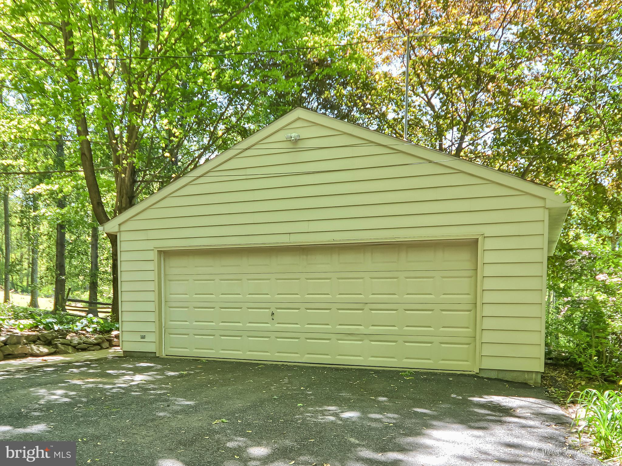 8031 Gambrill Park Road Frederick, MD 21702 - Photo 23 of 30 Over-sized 2 car garage w/workspace