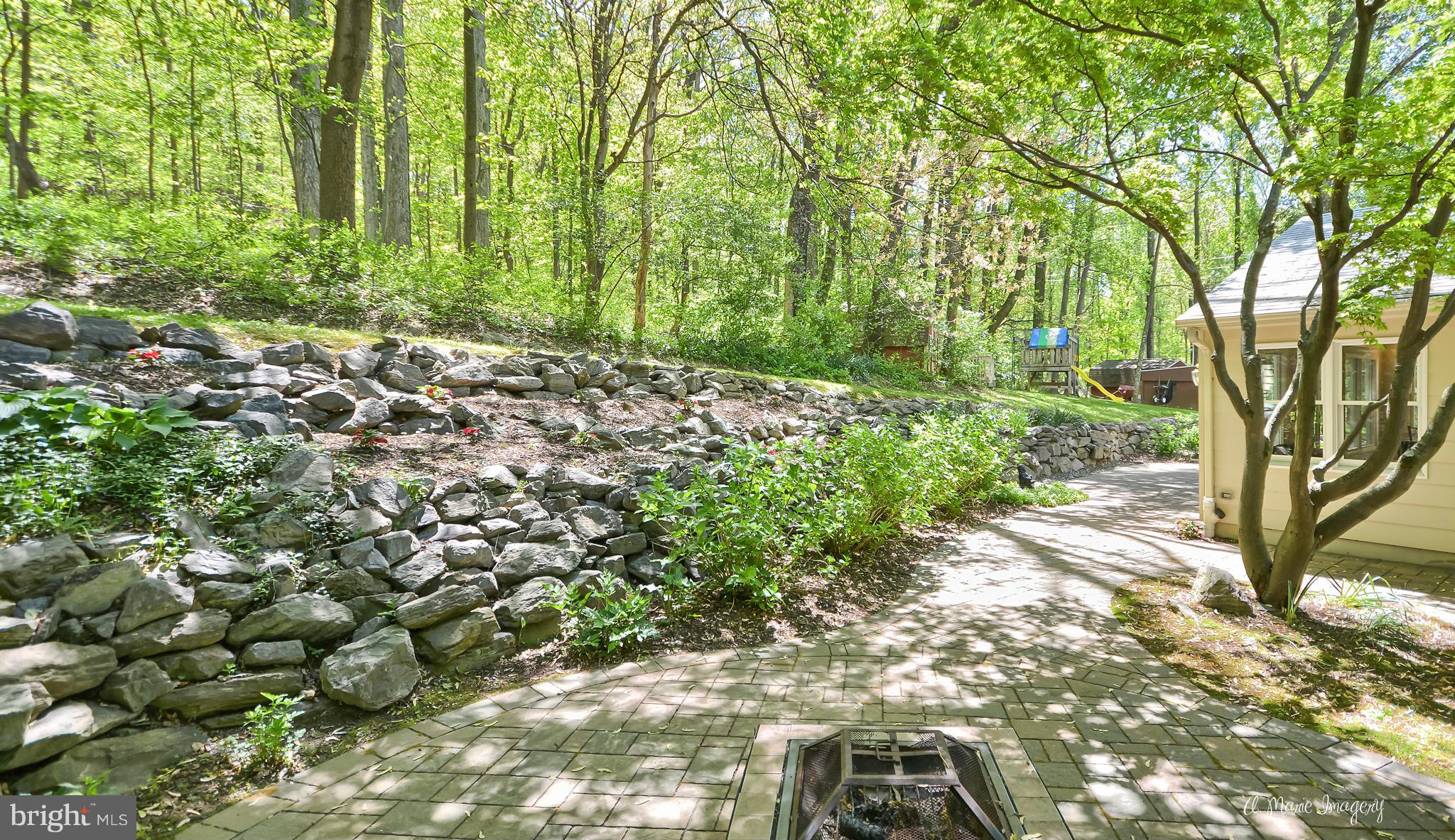 8031 Gambrill Park Road Frederick, MD 21702 - Photo 25 of 30 Hard-scaped grounds w/welcoming privacy