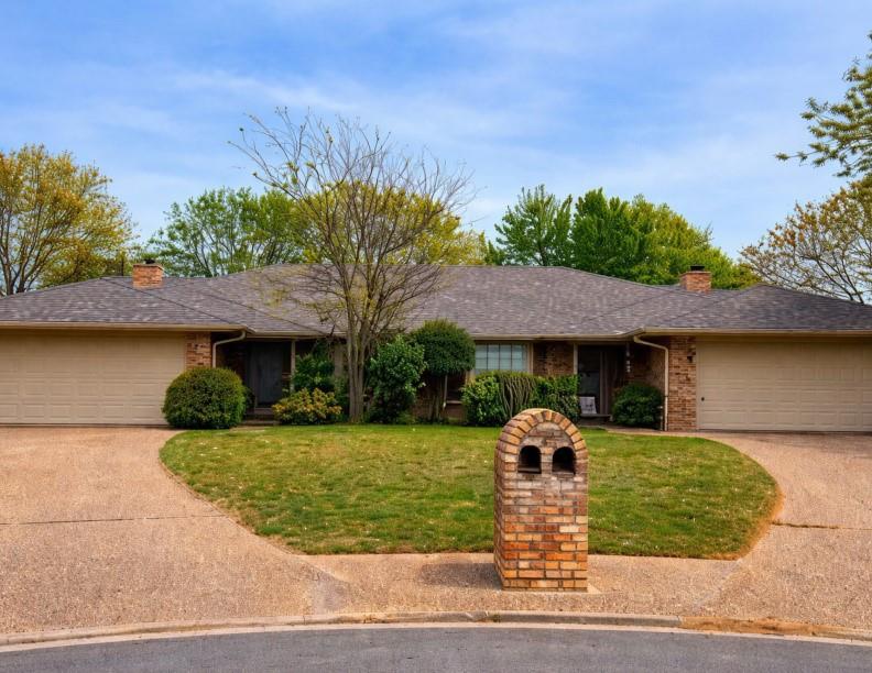 1500 Sharron Court Cleburne, TX 76033 - Photo 1 of 14 a front view of a house with a yard