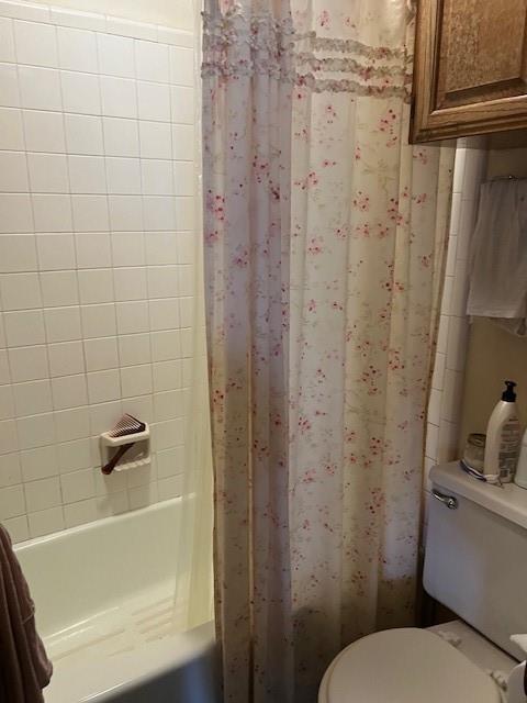 1500 Sharron Court Cleburne, TX 76033 - Photo 14 of 14 a bathroom with a shower and a toilet