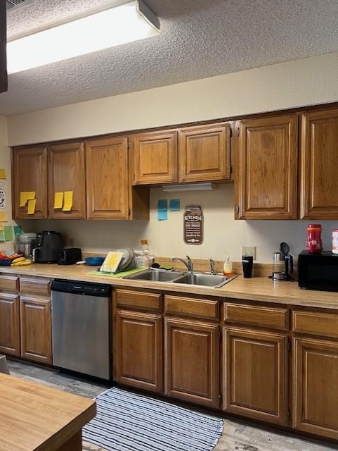 1500 Sharron Court Cleburne, TX 76033 - Photo 3 of 14 a kitchen with stainless steel appliances granite countertop a sink stove cabinets and wooden floor