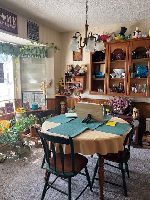 1500 Sharron Court Cleburne, TX 76033 - Photo 4 of 14 a view of a dining room with furniture and chandelier