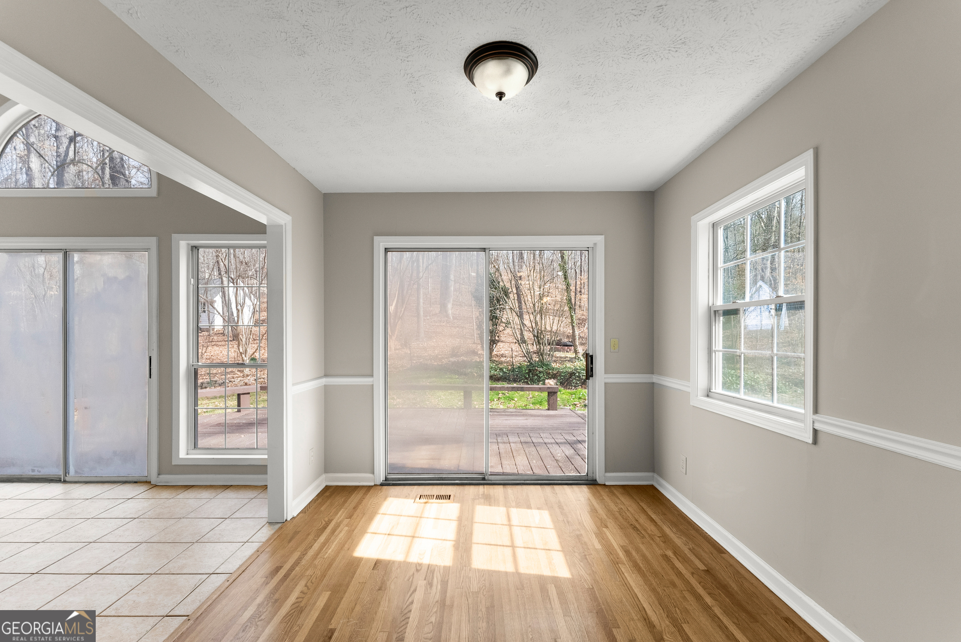 5011 Weaver Road Gainesville, GA 30507 - Photo 34 of 62 an empty room with windows