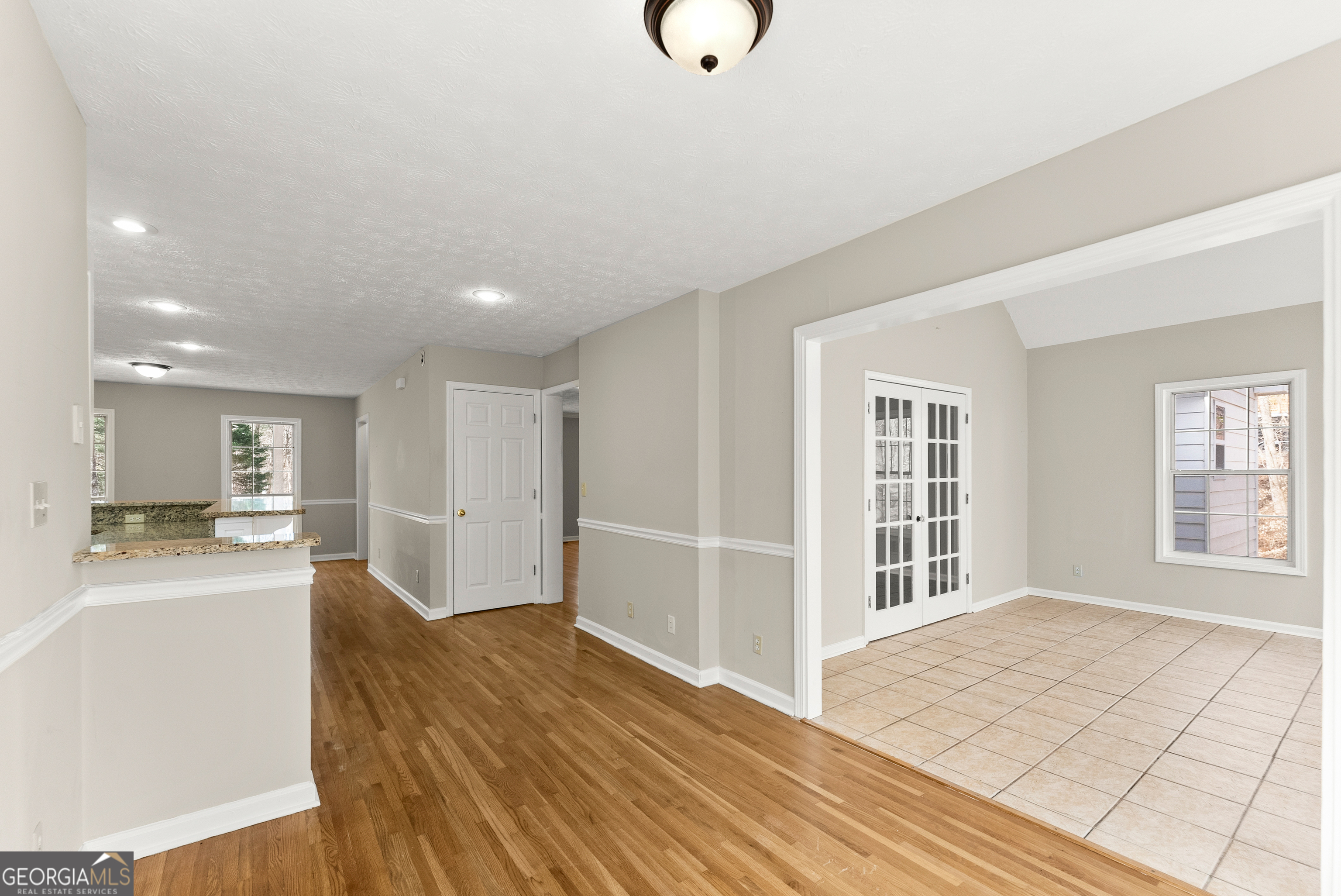 5011 Weaver Road Gainesville, GA 30507 - Photo 35 of 62 a view of a livingroom with wooden floor and furniture