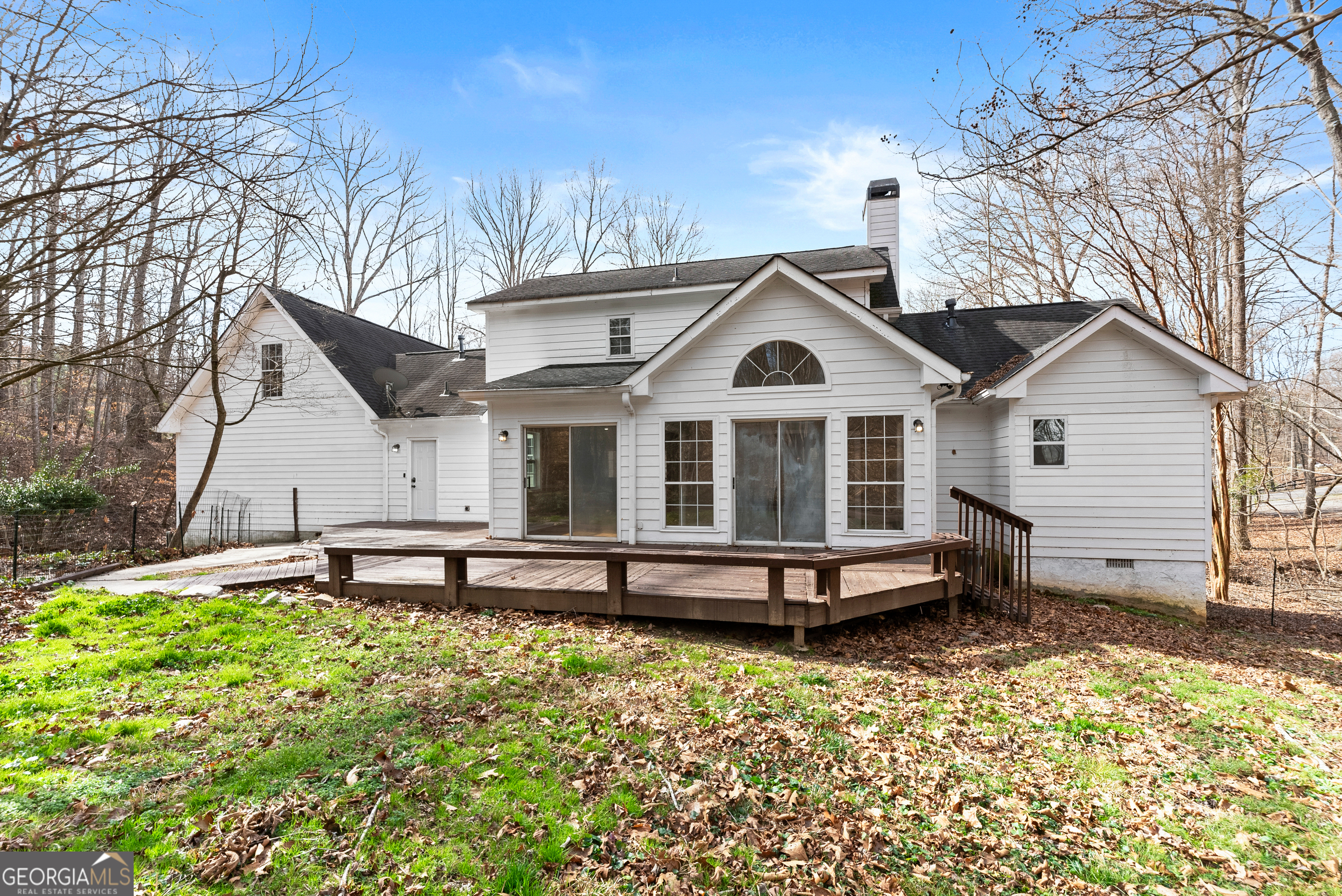 5011 Weaver Road Gainesville, GA 30507 - Photo 53 of 62 a front view of a house with a garden